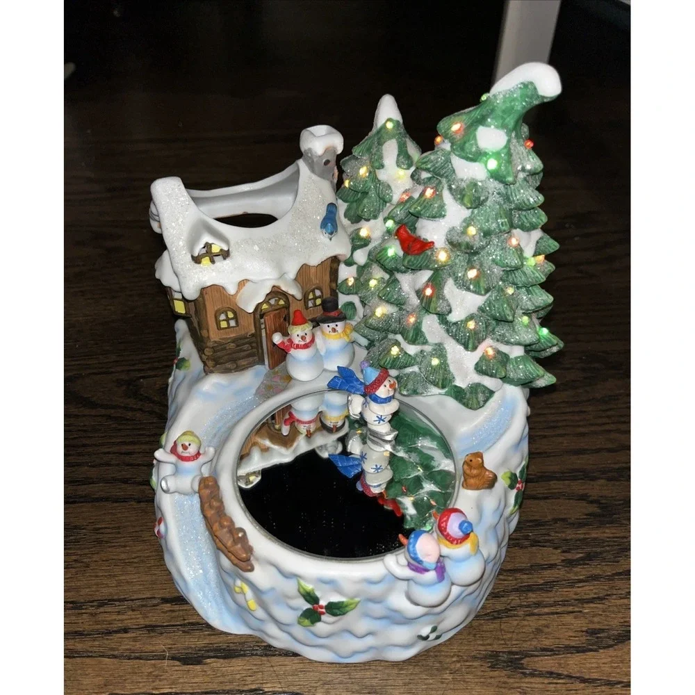 Home Interiors Musical Lighted Winter Scene Skating Snowman Figurine Works Great
